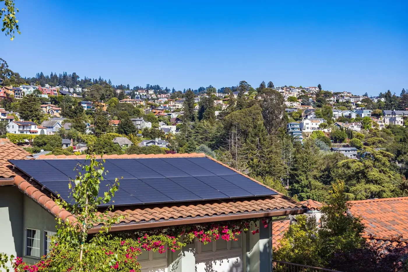 Solar panels on the roof of a detached family home