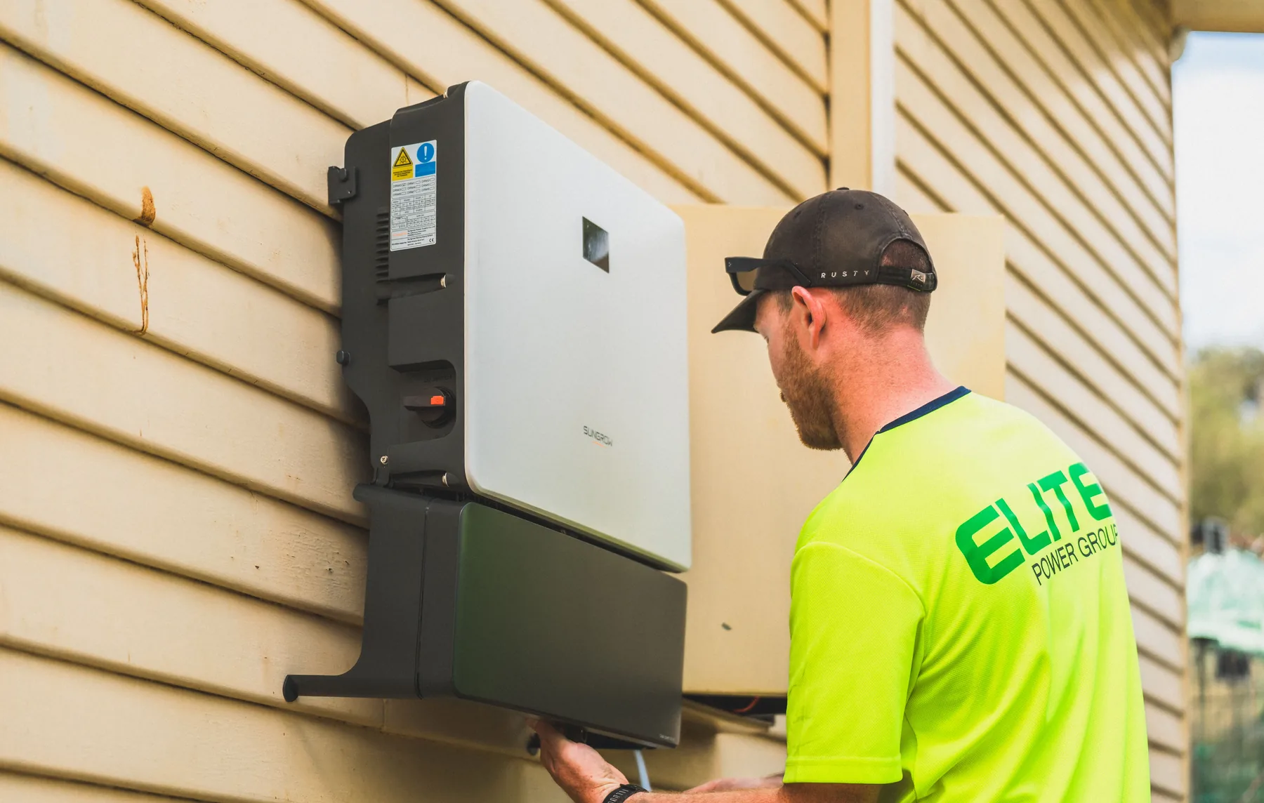 Solar inverter and electrical connections mounted on a wall